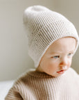 Speckled cotton knit hat for babies, featuring a soft ribbed design in a stylish, gender-neutral color. Ideal for keeping little heads and ears warm during colder months.